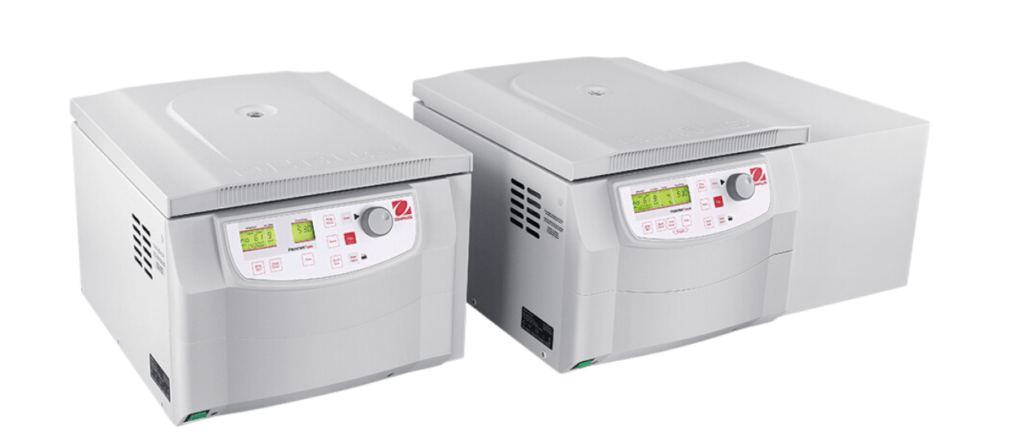 Two Ohaus centrifuges side-by-side. One refrigerated, one non-refigerated